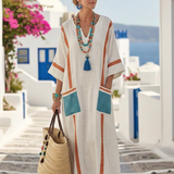 Madeleine | Vestido Maxi con Mangas Medias y Escote en V" can be rewritten as:

"Madeleine | Vestido Maxi con Mangas Tres Cuartos y Escote en V