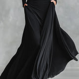 Noémie | Vestido Largo Negro con Escote Bateau y Sofisticado Drapeo