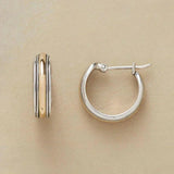 Eleganckie srebrne kolczyki w formie kółek z złotą linią